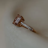 Morganite ring set with pave diamonds